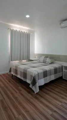 Uma cama ou camas num quarto em Pousada Areia Cristal