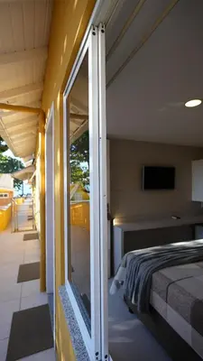 Uma cama ou camas num quarto em Pousada Areia Cristal