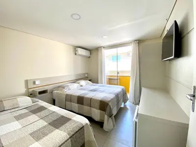 Uma cama ou camas num quarto em Pousada Areia Cristal