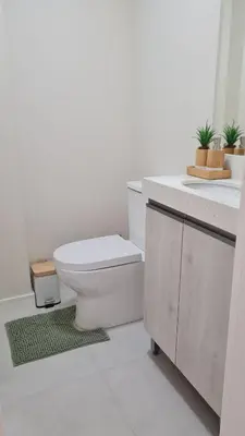 Uma casa de banho em Apartamento no centro de Itapema