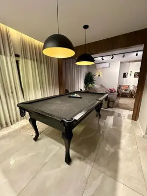 Uma mesa de bilhar em Fernando Sipriano