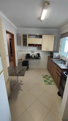 A cozinha ou kitchenette de Half Beach Apartment - Itapema