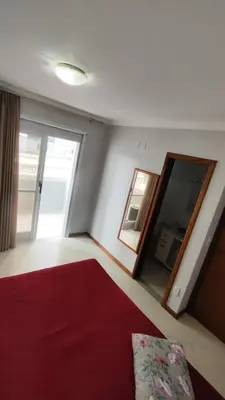 Uma cama ou camas num quarto em Half Beach Apartment - Itapema