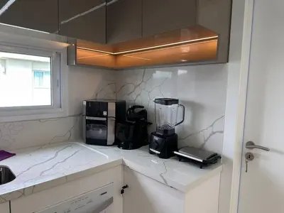 A cozinha ou kitchenette de Apartamento alto padrão, Novo, quadra mar em Balneário Perequê, Porto Belo - SC