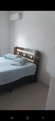 Uma cama ou camas num quarto em Casa do Zeca