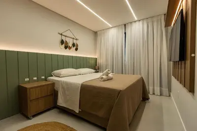 A planta de Di Ravena 101 - Apartamento Moderno em Canto Grande a 120 Metros do Mar.