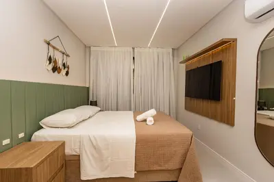 A planta de Di Ravena 101 - Apartamento Moderno em Canto Grande a 120 Metros do Mar.