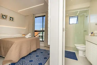 A planta de Di Ravena 101 - Apartamento Moderno em Canto Grande a 120 Metros do Mar.