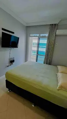 Uma cama ou camas num quarto em Ap 3 Quartos 150m do Mar no Coração da Meia Praia