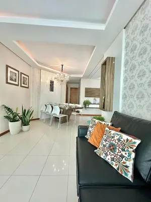 Uma área de estar em Achei Itapema • Dona Nina Residencial, R.255