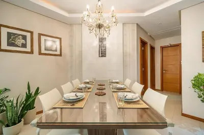 Uma área de estar em Achei Itapema • Dona Nina Residencial, R.255