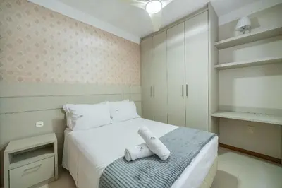 Uma cama ou camas num quarto em Achei Itapema • Dona Nina Residencial, R.255