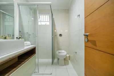 Uma casa de banho em Achei Itapema • Dona Nina Residencial, R.255