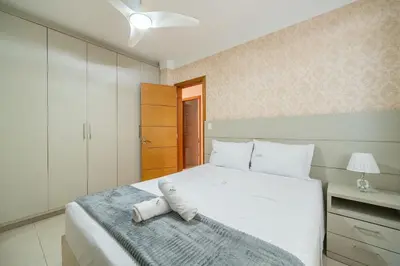 Uma cama ou camas num quarto em Achei Itapema • Dona Nina Residencial, R.255