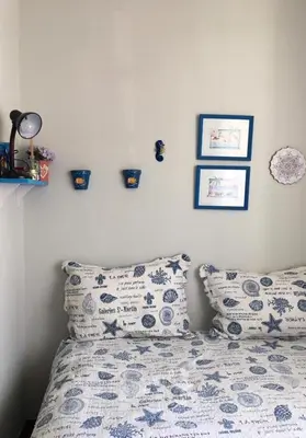 Uma cama ou camas num quarto em Casa Canto Encanto em Canto Grande Bombinhas SC