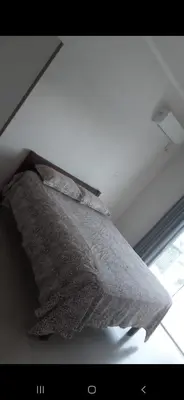Uma cama ou camas num quarto em Casa do Zeca