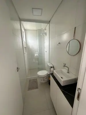 Uma casa de banho em Apto novo Itapema
