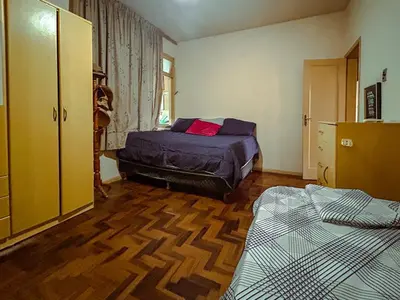 Uma cama ou camas num quarto em Apartamento amplo para famílias 3 quartos a poucos passos da praia, Barra Sul