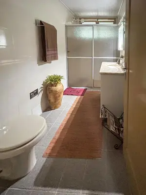 Uma casa de banho em Apartamento amplo para famílias 3 quartos a poucos passos da praia, Barra Sul