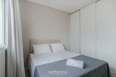 Uma cama ou camas num quarto em Apto 3 Suites a 600m da praia em Porto Belo PDP904