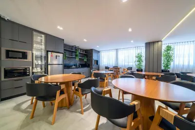 A cozinha ou kitchenette de Apartamentos Elegance