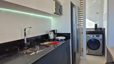 A cozinha ou kitchenette de CURTA! |165| Lindo Studio | Próx Centro de Eventos