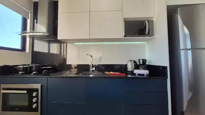 A cozinha ou kitchenette de CURTA! |165| Lindo Studio | Próx Centro de Eventos