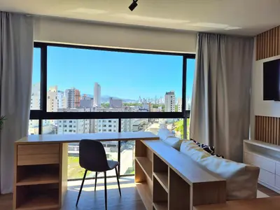 Uma cama ou camas num quarto em CURTA! |165| Lindo Studio | Próx Centro de Eventos