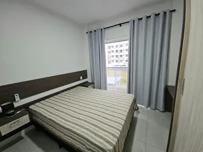 Uma cama ou camas num quarto em cód 116 - Apartamento amplo e aconchegante