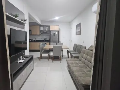 Uma televisão e/ou sistema de entretenimento em cód 116 - Apartamento amplo e aconchegante