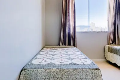 Uma cama ou camas num quarto em Ampla cobertura com vista panorâmica! 0205
