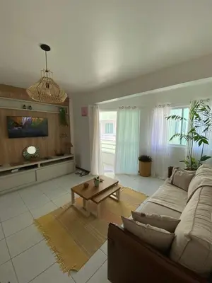 Uma televisão e/ou sistema de entretenimento em Apartamento Vitoria