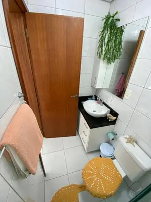 Uma casa de banho em Apartamento Vitoria