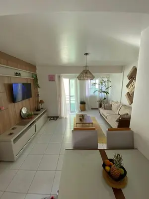 Uma televisão e/ou sistema de entretenimento em Apartamento Vitoria