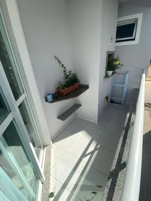 Uma área de estar em Apartamento Vitoria