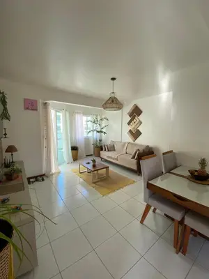 Uma área de estar em Apartamento Vitoria