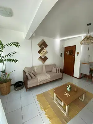 Uma área de estar em Apartamento Vitoria