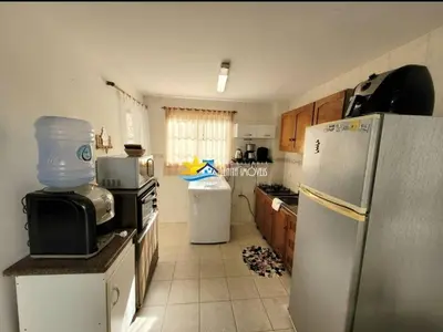 A cozinha ou kitchenette de Lindo Sobrado à 220m Praia do Mariscal