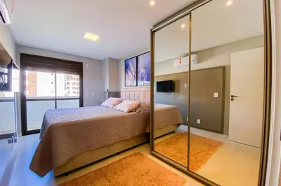 Uma cama ou camas num quarto em Apartamento em home clube