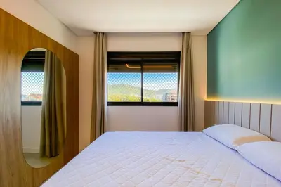 Uma cama ou camas num quarto em Cobertura com Piscina e Vista Deslumbrante! 0213
