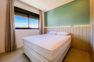 Uma cama ou camas num quarto em Cobertura com Piscina e Vista Deslumbrante! 0213