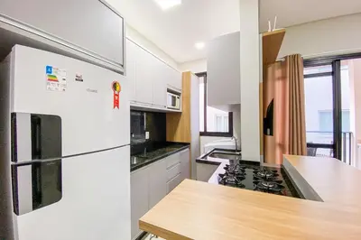 A cozinha ou kitchenette de Apto novo com piscina livre aos hóspedes! - 0188