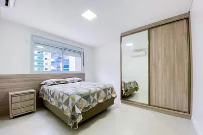 Uma cama ou camas num quarto em Apto Luxuoso com 3 Suítes - 0312