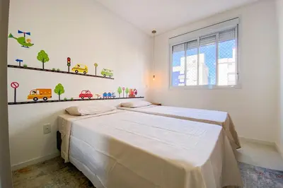 Uma cama ou camas num quarto em Viva o Paraíso Apto na Praia de Palmas - 0221