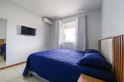 Uma cama ou camas num quarto em Apto na Villa Gastronômica em Palmas - 0223