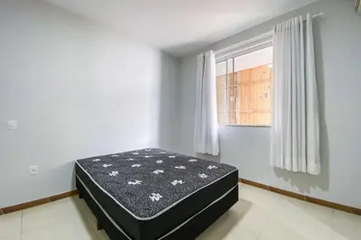 Uma cama ou camas num quarto em Apto na Villa Gastronômica em Palmas - 0223
