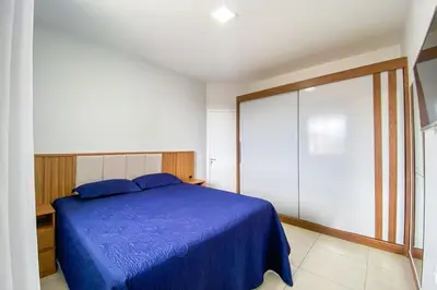 Uma cama ou camas num quarto em Apto na Villa Gastronômica em Palmas - 0223
