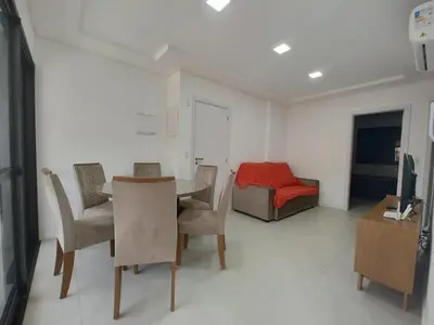Uma televisão e/ou sistema de entretenimento em Apto 290m da Praia de Palmas - 0327