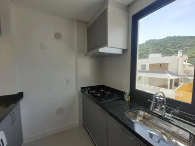 A cozinha ou kitchenette de Apto 290m da Praia de Palmas - 0327