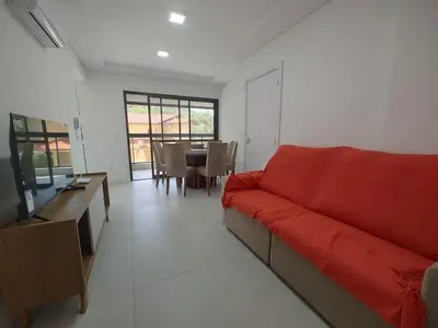 Uma área de estar em Apto 290m da Praia de Palmas - 0327